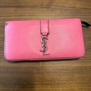 YSL pink zippy wallet.